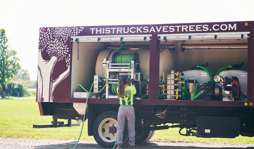 An Independent Tree's truck being used to do Plant Health Care.